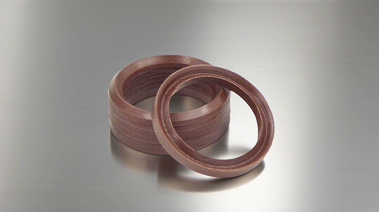 氟橡膠V型夾布油封---是由氟橡膠（FKM）+夾布密封材料制成的油封，主要應(yīng)用于盾構(gòu)機(jī)、冶金設(shè)備、陶瓷設(shè)備、重載油缸、油壓機(jī)等